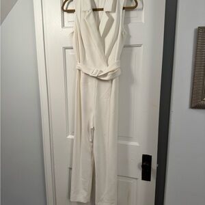 Tart White Sleeveless Belted Jumpsuit